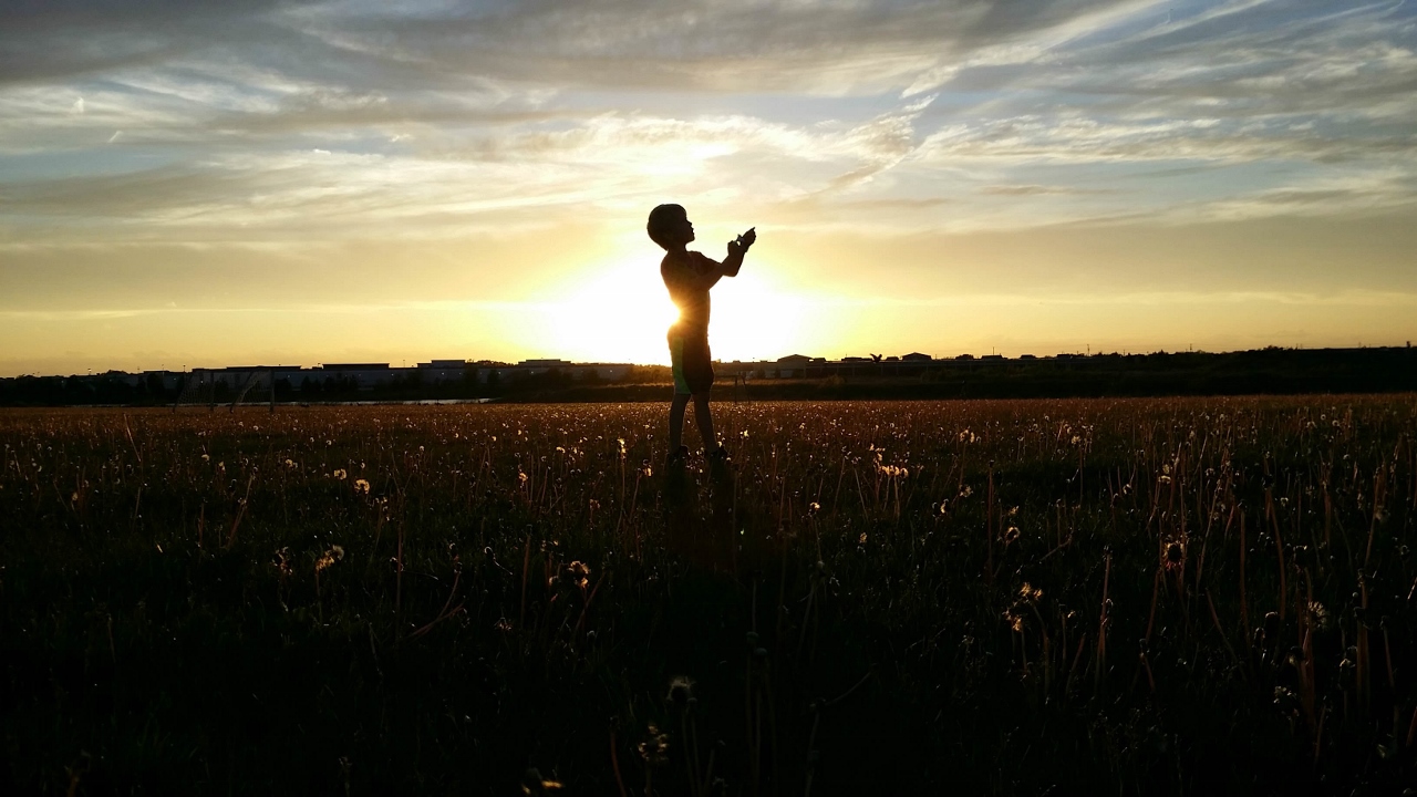 memories-young-boy-sunset-silhouette
